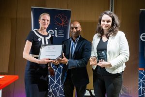 Image of award recipients collecting their award